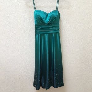 Emerald green glitzy party dress